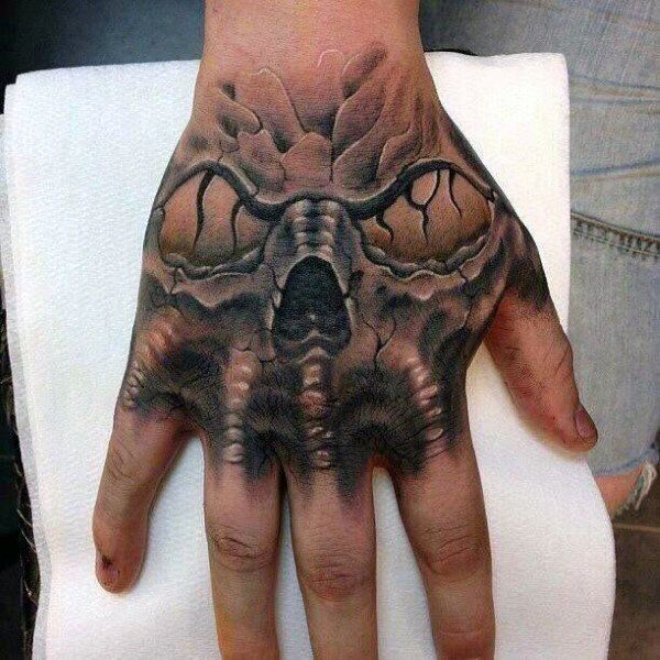 101 Best Skull Hand Tattoo Designs You Need To See