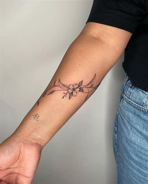 20 Captivating Wraparound Arm Tattoo Designs To Inspire Your Ink Womensew