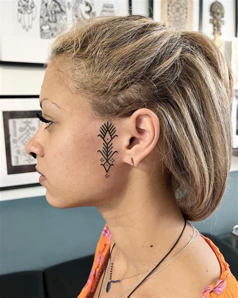 30 Stunning Face Tattoo Ideas For Men And Women In 2024