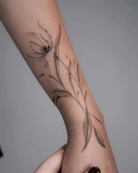 33 Stunning Flower Tattoos That Radiate Beauty And Softness