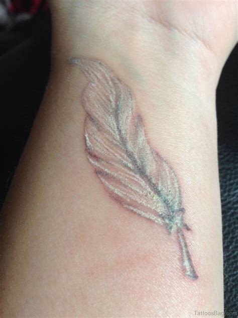 56 Cute Feather Tattoo On Wrist Tattoo Designs Tattoosbag Com