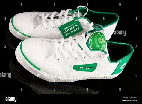 A Pair Of Dunlop Green Flash Tennis Shoes With Box Stock Photo Alamy