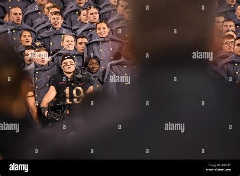 A West Point Football Player Sings From The Crowd At The 119Th Army