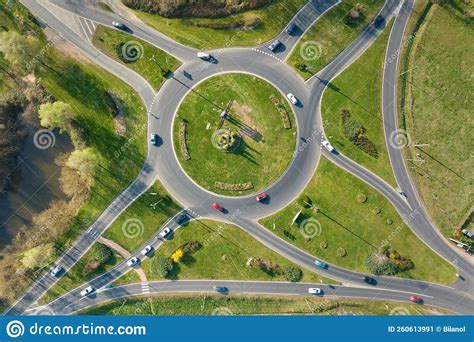 Aerial View Of Road Roundabout Intersection With Moving Heavy Traffic Urban Circular