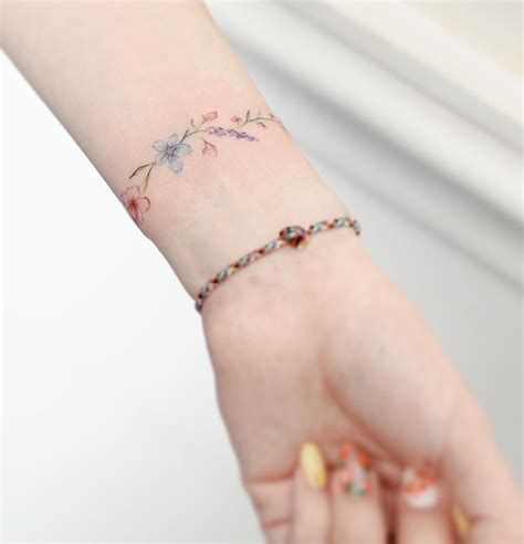 Artist Anzotattoo Delicate Flower Tattoo Flower Wrist Tattoos Wrist