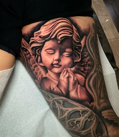 Baby Angel Tattoo Designs For Men