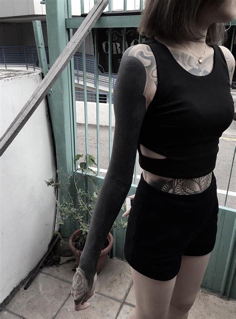 Blackout Tattoos Is The New Trend From Singapore Demilked