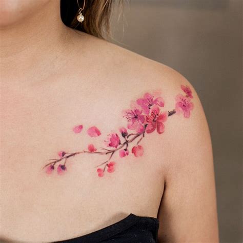 Cherry Blossom Tattoo On Back Shoulder And Collarbone Cherry Blossom Tattoo Shoulder Blossom