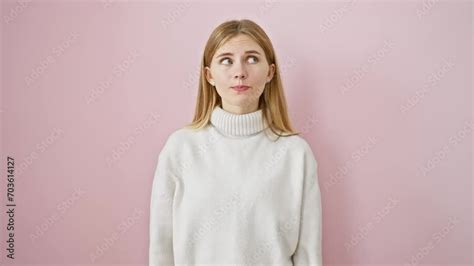 Enthralling Blonde Girl In Winter Sweater With Blue Eyes Cheerful