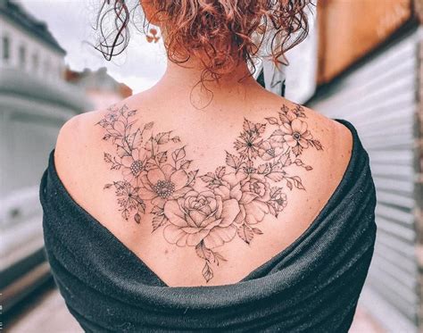 Feminine Female Tattoos Designs On The Back