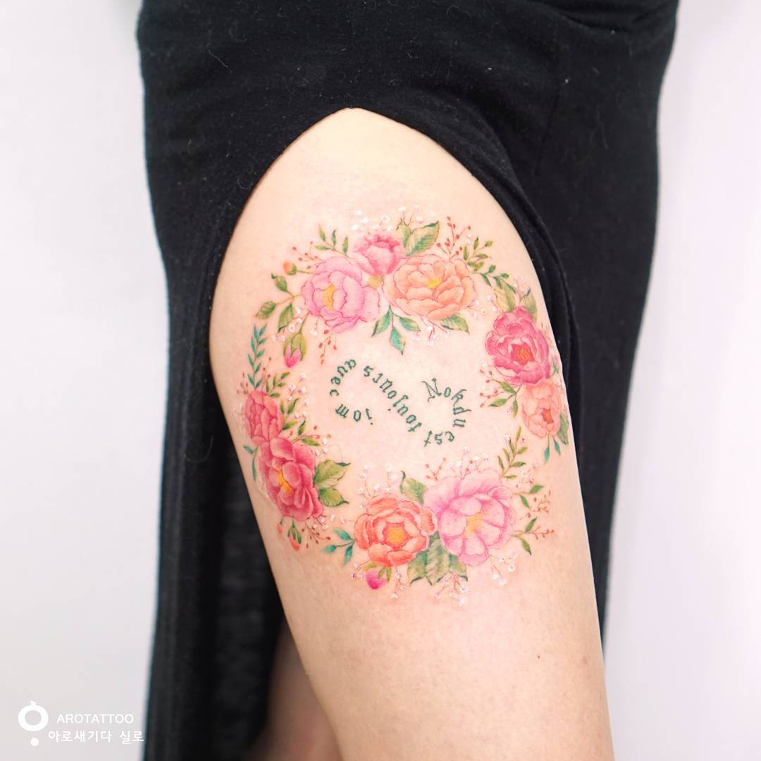 Floral Ring Tattoo Located On The Finger