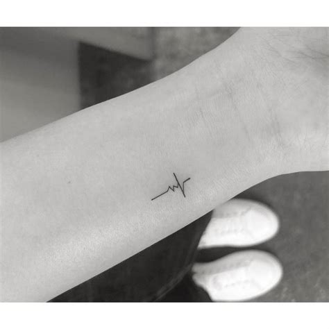 Heartbeat Tattoo Located On The Wrist Minimalistic