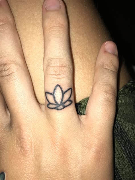 Lotus Flower Finger Tattoo