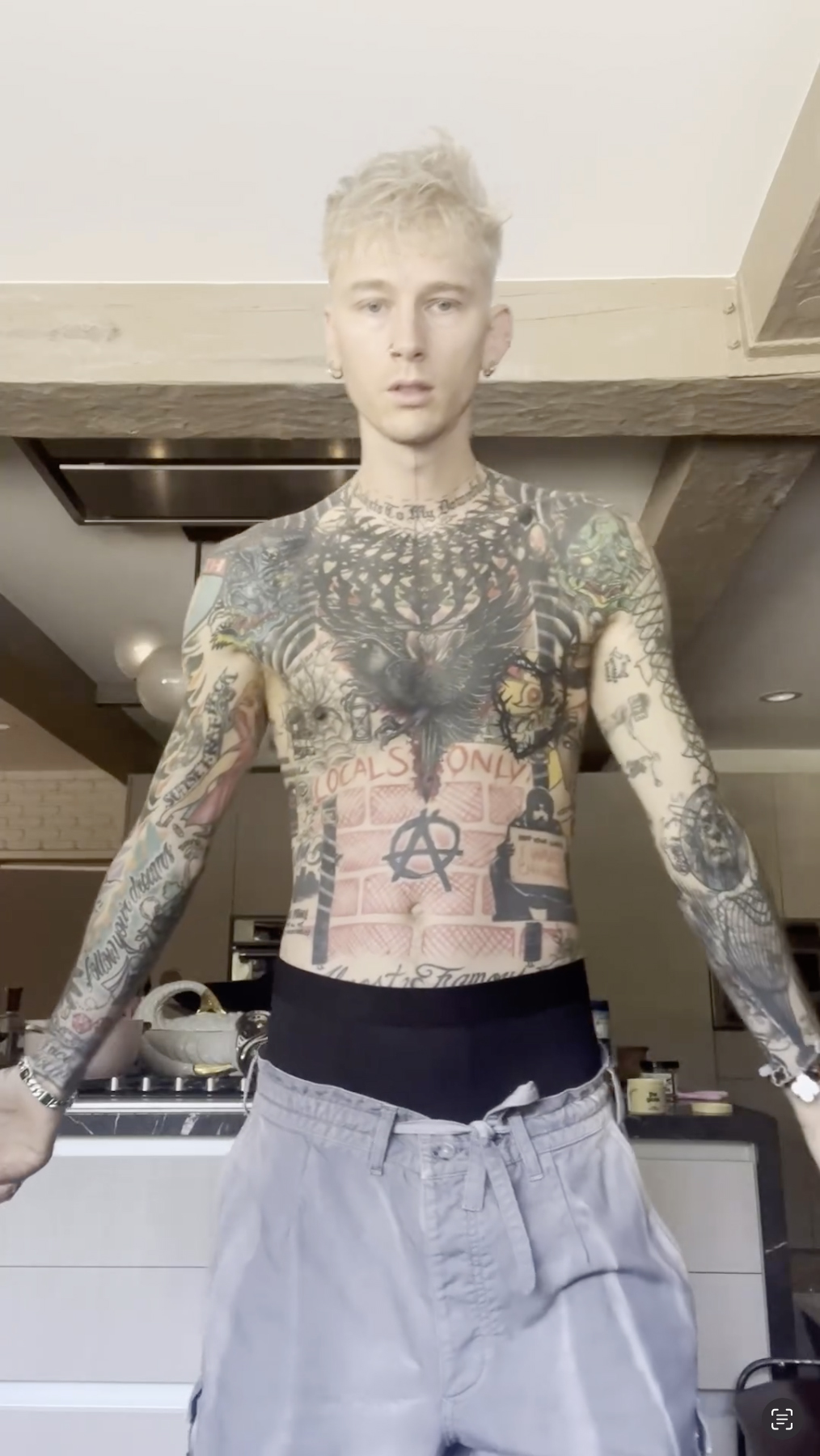 Machine Gun Kelly Shares Inside Look At Blackout Tattoo Process