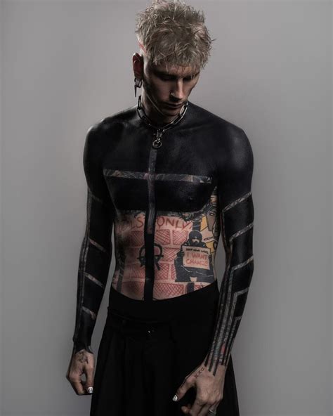 Machine Gun Kelly Shows Off Wild New Blackout Tattoos On His Arms