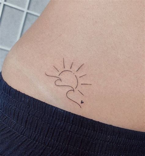 Minimalist Sun And Wave Tattoo On The Hip Sun Tattoos Waves Tattoo Sunset Tattoos