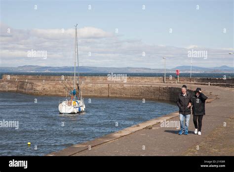 Musselburgh Promenade Edinburgh Scotland Uk Couple Walking On