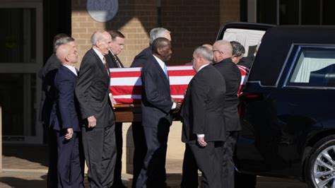 National Funeral Service Flyover And 39 Bells For Carter Sendoff