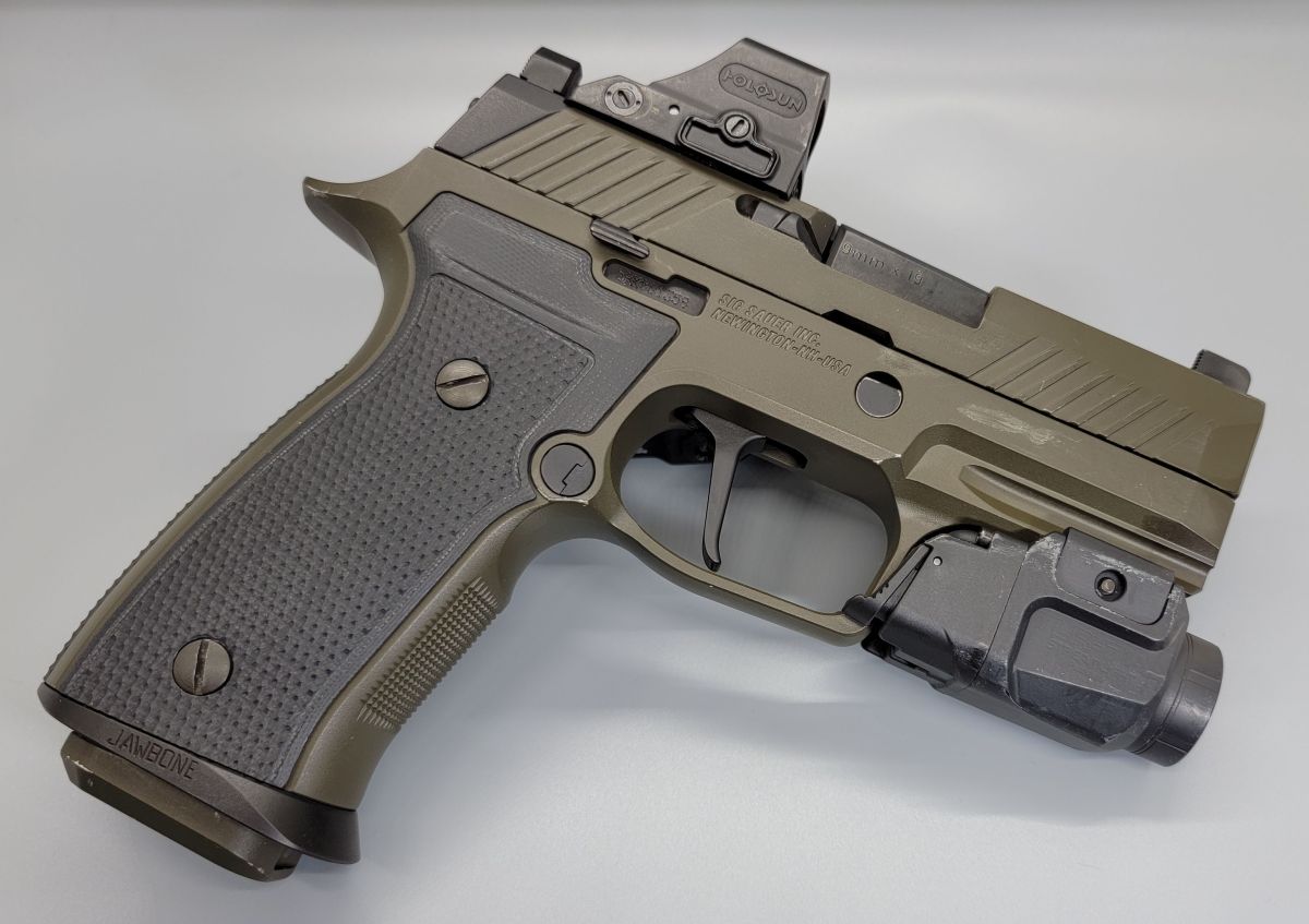 P320 Axg With Tactical Development Grip Panels And Magwell P320