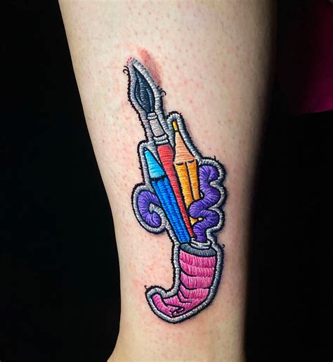 Paintbrush And Pencil Tattoo