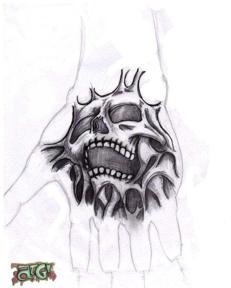 Picture Of A Hand Skull Tattoo Is An Easy And Stylish Piece