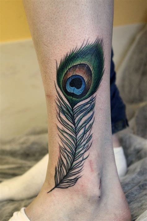 Pin By Misha Genesis On Body Decor Peacock Tattoo Tattoos Feather Tattoos