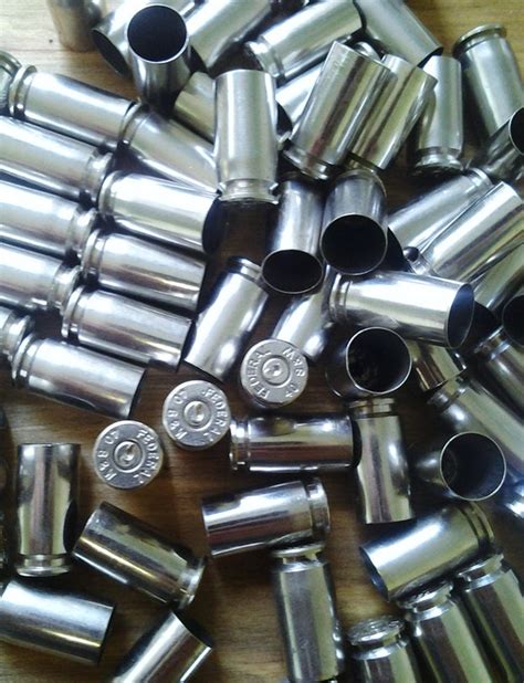 Set Of 100 Bullet Casings 40 Caliber Silver Tone Polished