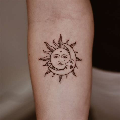 Sun And Moon Tattoo Placed On The Inner Forearm