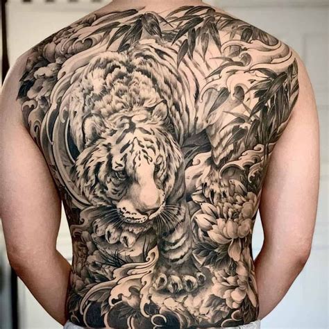 Tattoo Tiger On The Back Stock Photo Alamy