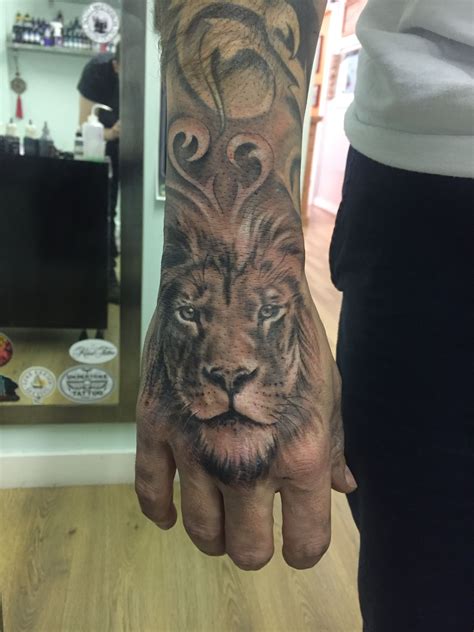 Thewildtattoo Com Lion Hand Tattoo Men Lion Hand Tattoo Hand Tattoos