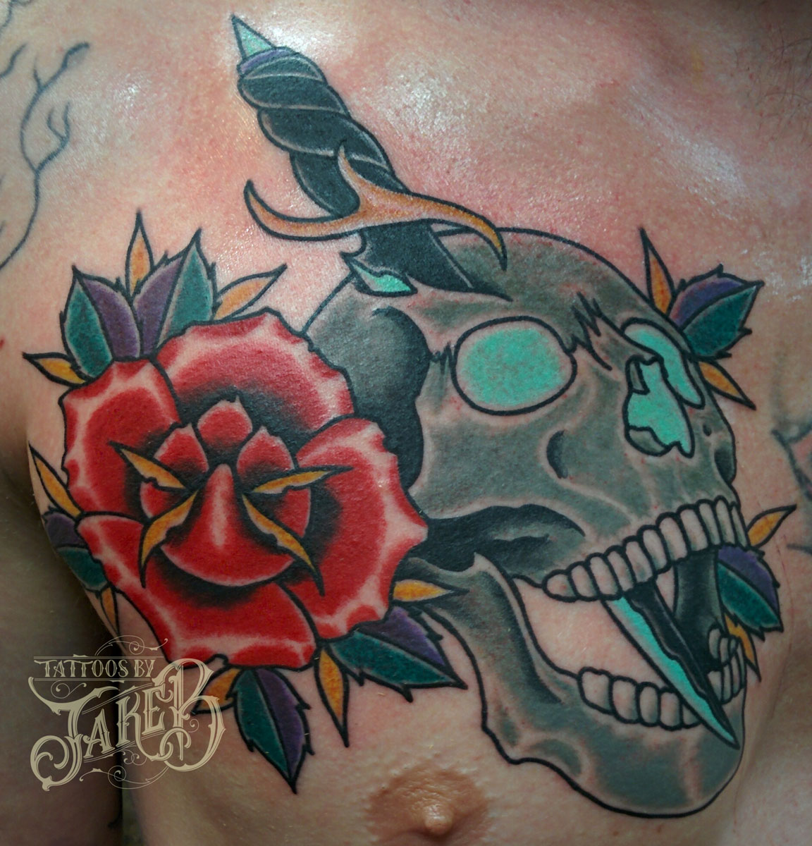 Traditional Skull And Rose Tattoos