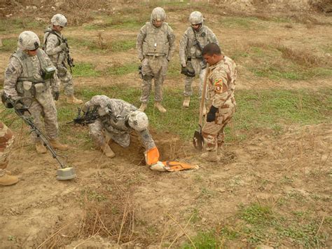 U S Iraqi Soldiers Uncover Weapons Caches Article The United