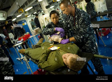 U S Navy Corpsmen Triage A Simulated Patient During A Mass Casualty