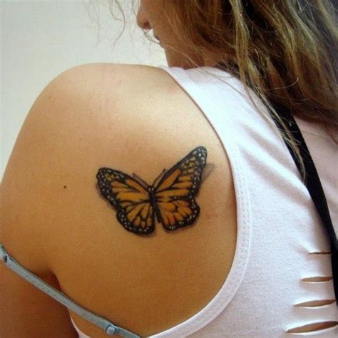 Yellow Black Ink Butterfly Tattoo On Back Shoulder Tatouage Tatouage